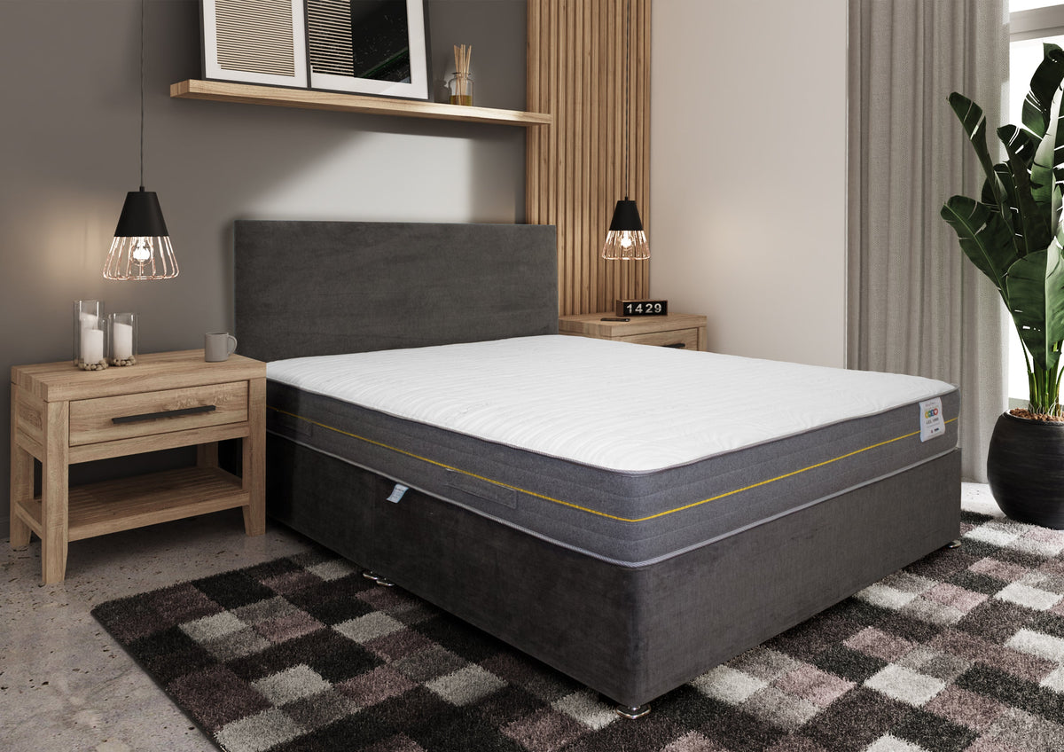 Gel 1000 Joint Relief Mattress, in a bedroom setting, yellow piping